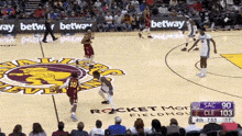 a basketball game is being played on a court with rocket mortgage fieldhouse written on the floor