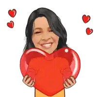 a woman in a red sweater is holding a heart in her hands