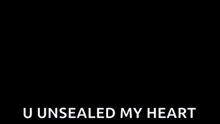 a close up of a person 's torso with the words `` u unseated my heart '' written below it .