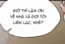 a speech bubble in a foreign language with a man 's face in the background