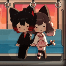 a boy and a girl are sitting next to each other on a train
