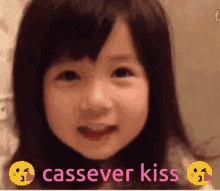 a picture of a little girl with the words cassever kiss on it