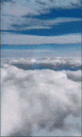 a blue sky with a lot of clouds floating in it