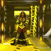 a woman is standing in front of a yellow sign that says " ervalued "