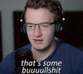 a man wearing headphones and glasses is saying that 's some buuuulshit