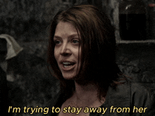 a woman says i 'm trying to stay away from her in a dark room