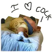 a man laying on a bed with the words " i love cock " written above him