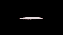 a black background with a red devil 's mouth and teeth
