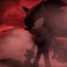 shadow the hedgehog from the video game sonic the hedgehog is standing in the smoke .