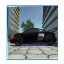 a black sports car is parked on a sidewalk in front of a building