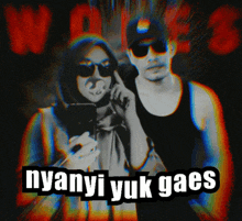 a man and a woman are standing next to each other with the words " nyanyi yuk gaes " on the bottom