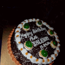a birthday cake with the name salehin written on it