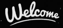 a black and white sign that says welcome on it