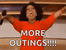 a woman is holding a microphone with her arms in the air and says more outings !!!