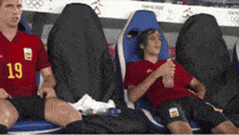 a soccer player with the number 19 on his shirt