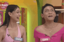 a man and a woman are standing next to each other and the woman has a name tag that says charlie on it