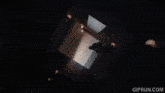 a close up of a person 's hand with a gifrun.com watermark in the corner