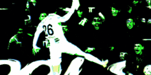 a soccer player with the number 26 on the back of his jersey