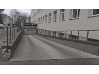 a building with a ramp leading up to it and a sign that says " centrum kultury "