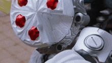 a close up of a toy with a red star on the top