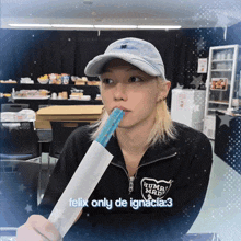 a person wearing a felix only de ignacia 3 shirt is eating something