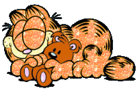 garfield is laying down with a teddy bear