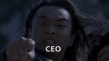 a man is pointing at the camera and says ceo your soul is mine !!
