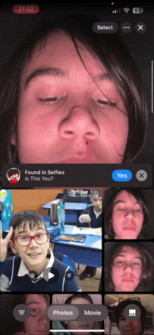 a phone screen shows a person 's face and the words found in selfies is this you