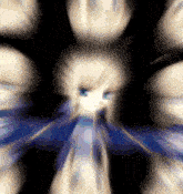 a blurry picture of a girl with blue eyes and blonde hair