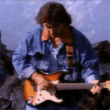 Playing The Guitar George Harrison GIF - Playing The Guitar George Harrison This Is Love Song GIFs