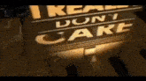 a sign that says `` i really don t care '' is lit up in the dark .