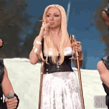 Smoking Donatella Versace GIF - Smoking Donatella Versace Saturday Night Live GIFs