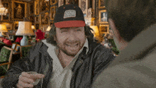 a man wearing a black hat that says cold chow on it