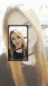 a picture of a woman 's face is framed in a square .
