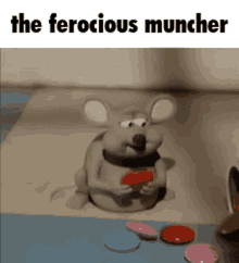 The Ferocious Muncher Clay Rat GIF - The Ferocious Muncher Clay Rat Clay Rat Eating Chocolate GIFs