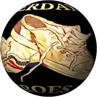 a black circle with a pair of shoes on it and the word shoes