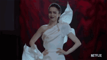 Pose Lily Collins GIF - Pose Lily Collins Emily Cooper GIFs