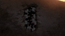 a girl in a black dress is standing in front of a wall with a bunch of rabbits on it