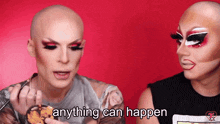 two drag queens holding a donut with the words " anything can happen " below them