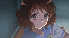 a close up of a girl with brown hair