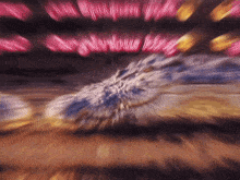 a blurry picture of a person 's face with a pink sign in the background that says ' i love you '