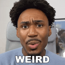 a man with a beard is making a funny face with the word weird written on his face