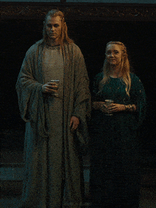a man and a woman standing next to each other with africanrabbit on the bottom