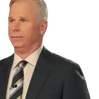 a man in a suit and tie is looking to the left