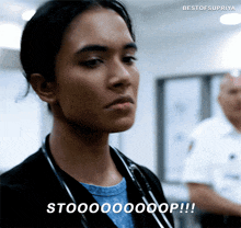a woman with a stethoscope around her neck says stoooooop