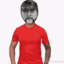 a man wearing a red shirt with a lacoste logo