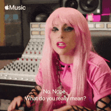 lady gaga is wearing a pink wig and a pink shirt