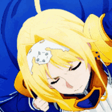 a close up of a girl with yellow hair and a white flower on her head