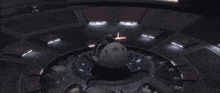 a computer generated image of a space ship with a glowing light coming out of it
