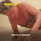 a shirtless man is doing push ups and says " esto es un desastre " in spanish